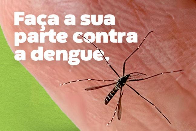 Mosquito Aedes pousado sobre um dedo humano. Texto sobre a foto: "Faça a sua parte contra a dengue."