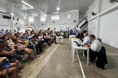 Secretário André Machado assinando contratos com a Caixa Econômica Federal 